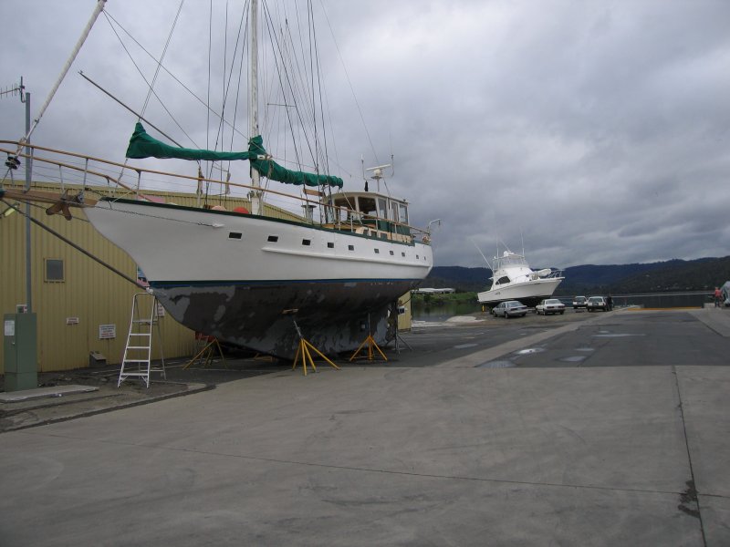 Yacht on hardstand beside the Cleanlift Marine shed